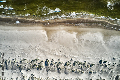 topdown drone view of a baltic sandy beach