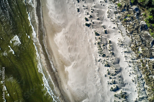 topdown drone view of a baltic sandy beach