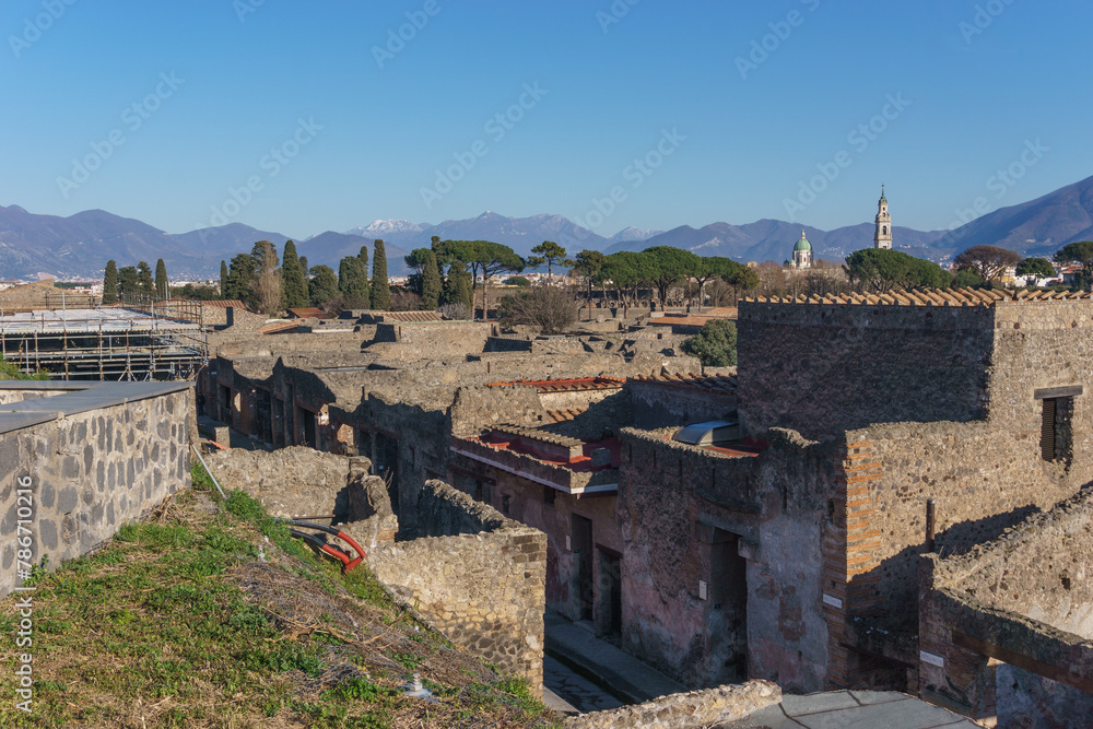 View over ruins of ancient roman town on a sunny day, Pompeii, Campania, Italy