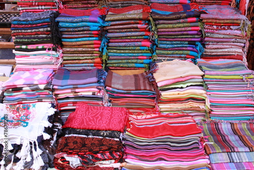 Pile of pashmina scarves for sale