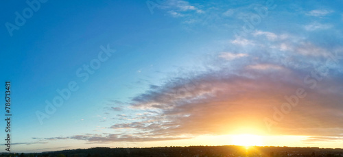High Angle Panoramic View of Sky and Colourful Clouds over England During Sunrise. 