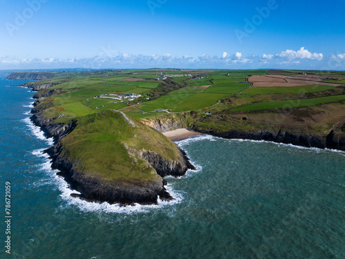 Aerial shot of Welsh coastline at Mwnt with cliffs and beach