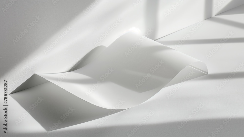 Abstract photo of wavy piece paper casting shadows on white surface Abstract photo of wavy piece paper casting shadows on white surface