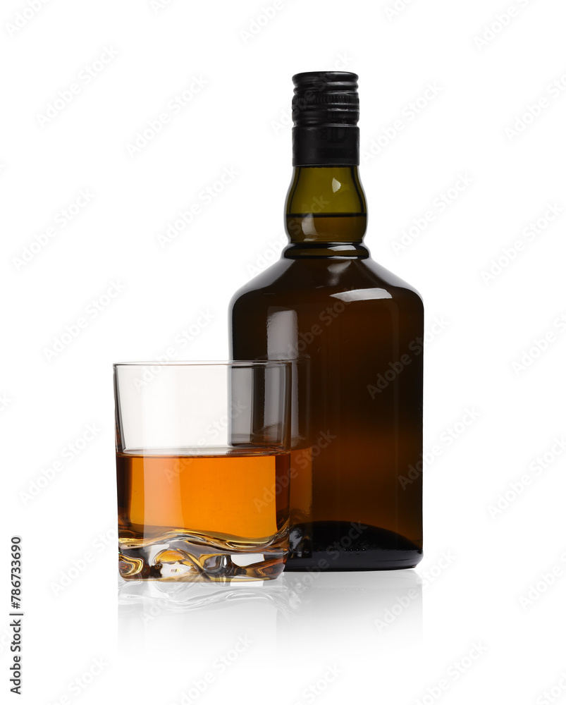 Glass and bottle of whiskey isolated on white Glass and bottle of whiskey isolated on white