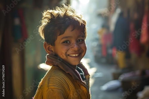 Portrait of a happy Indian child in the street, India.