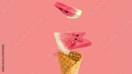 Creative animation of ice cream cone with falling watermelon pieces (ID: 786761686)