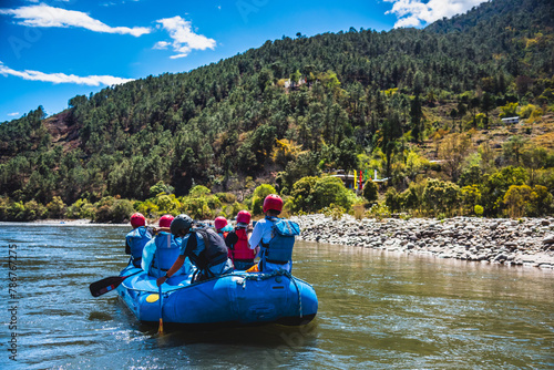 Punakha, Bhutan - Tourists ride on the rafting facility, providing an interesting experience for travel enthusiasts