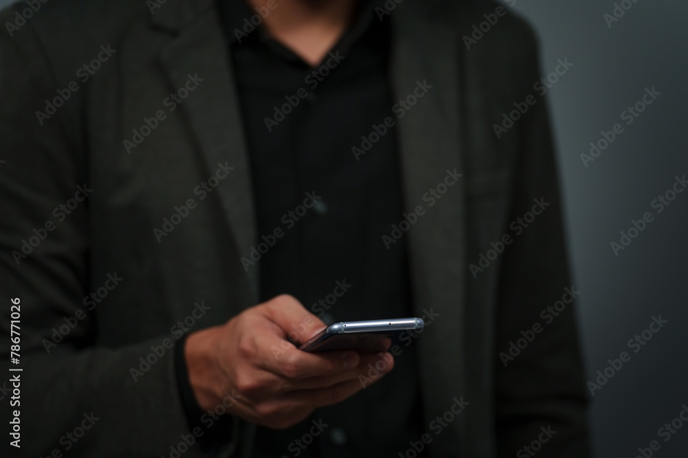 hand of businessman in suit using smartphone hand of businessman in suit using smartphone