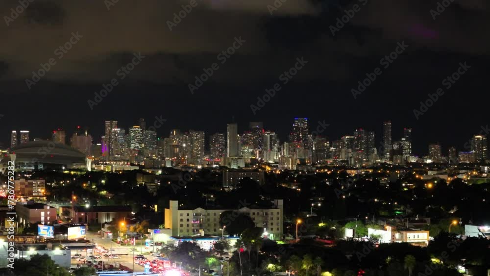 City of Miami at night with buildings in the background City of Miami at night with buildings in the background