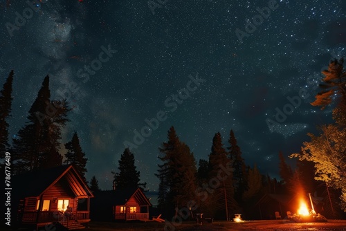A remote wilderness lodge with cozy cabins, crackling campfires, and starry skies, offering a true escape into nature's embrace, Generative AI © ManusiaIkan