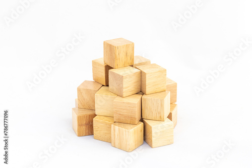 A pile of blank wooden cubes on a white isolated background