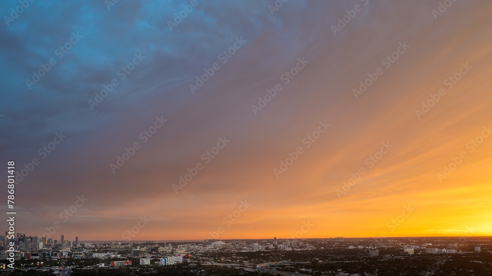 Sunset sky, sunrise with yellow and blue sky, romantic natural landscape 