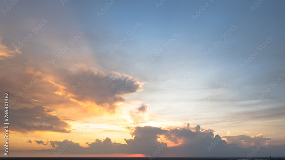 Sunset sky, sunrise with yellow and blue sky, romantic natural landscape 