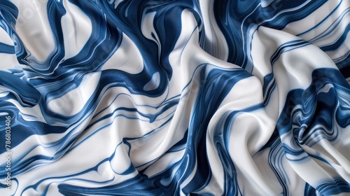 Silk fabric with a swirling marble pattern in shades of deep blue and white resembling ocean waves