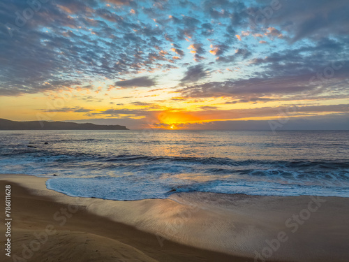 After the rain sunrise at the seaside © Merrillie
