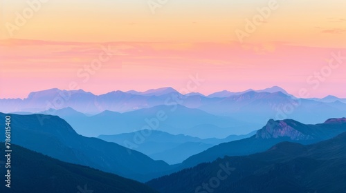 Mountain peaks under vibrant blue sky, majestic and serene landscape