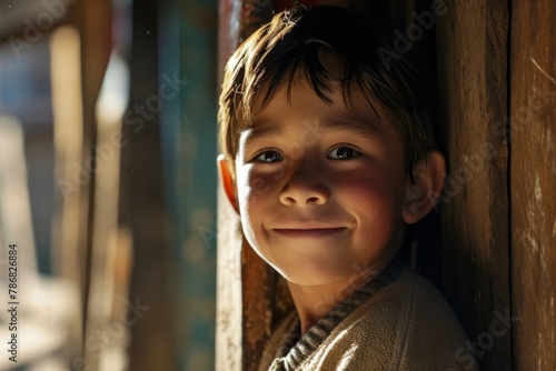 Portrait of a cute little boy in the village. Selective focus.