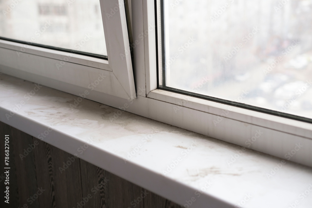 Need to clean the house, wash PVC window frames. Cleaning concept. Detergent for cleaning windows. Selective soft focus. Maintaining cleanliness in organization. Need to clean the house, wash PVC window frames. Cleaning concept. Detergent for cleaning windows. Selective soft focus. Maintaining cleanliness in organization.