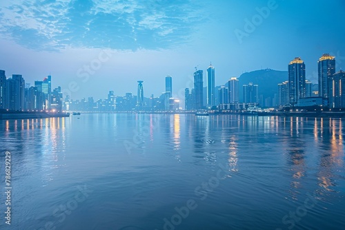a city skyline with a body of water in the foreground
