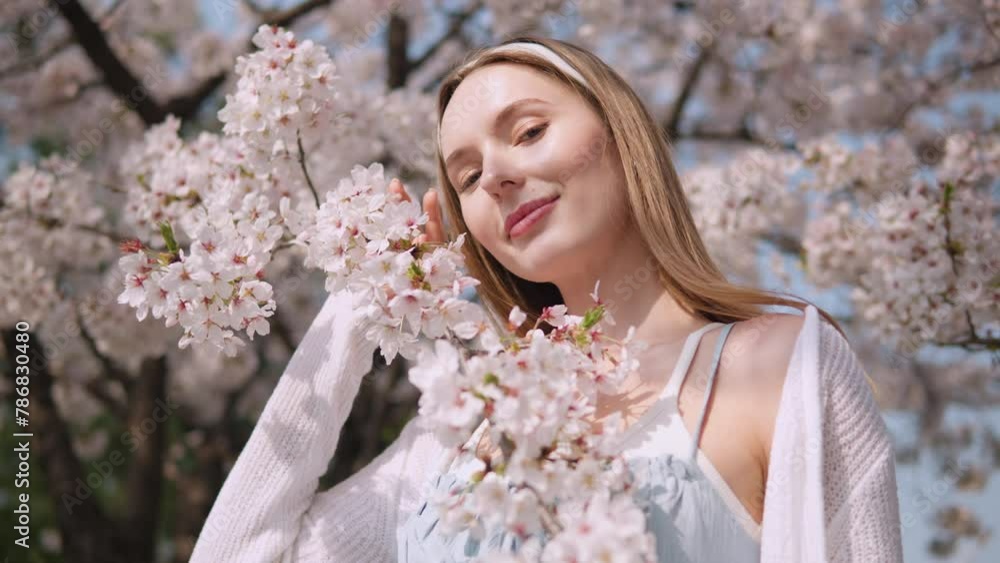 Lovely Model Posing On Sakura Blooming Flower Trees At Yangjae Citizen's Forest Park In Springtime In Seocho District, Seoul City, South Korea. Close-up Shot Lovely Model Posing On Sakura Blooming Flower Trees At Yangjae Citizen's Forest Park In Springtime In Seocho District, Seoul City, South Korea. Close-up Shot