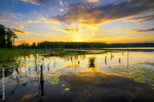 Beautiful summer sunset over the lake © Piotr Krzeslak