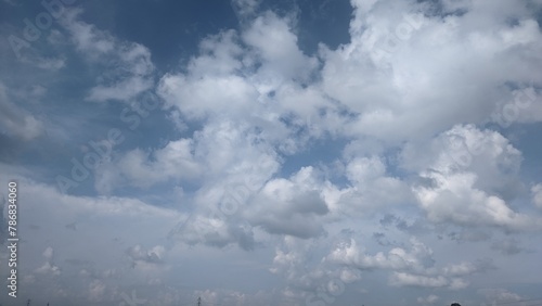 background texture of beautiful sky with fluffy whitecloud photo
