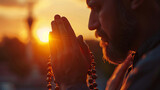 Muslim devotion, man with rosary praying, clear peaceful backdrop,