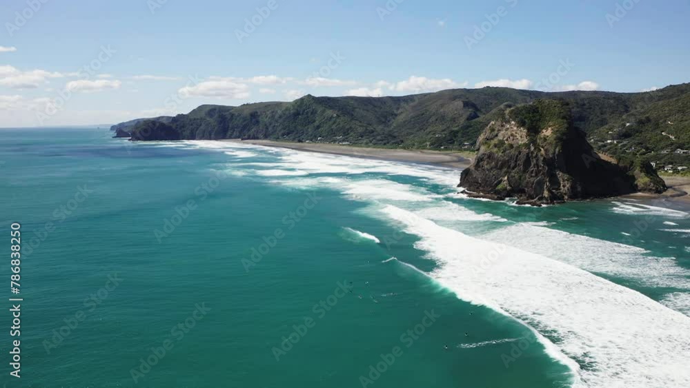 Looking along the rugged coastline Piha Beach, at the famous outcrop known as Lion Rock, in New Zealand. Looking along the rugged coastline Piha Beach, at the famous outcrop known as Lion Rock, in New Zealand.