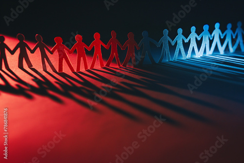 Red and Blue chain of paper doll people holding hands united together, representing different political politics