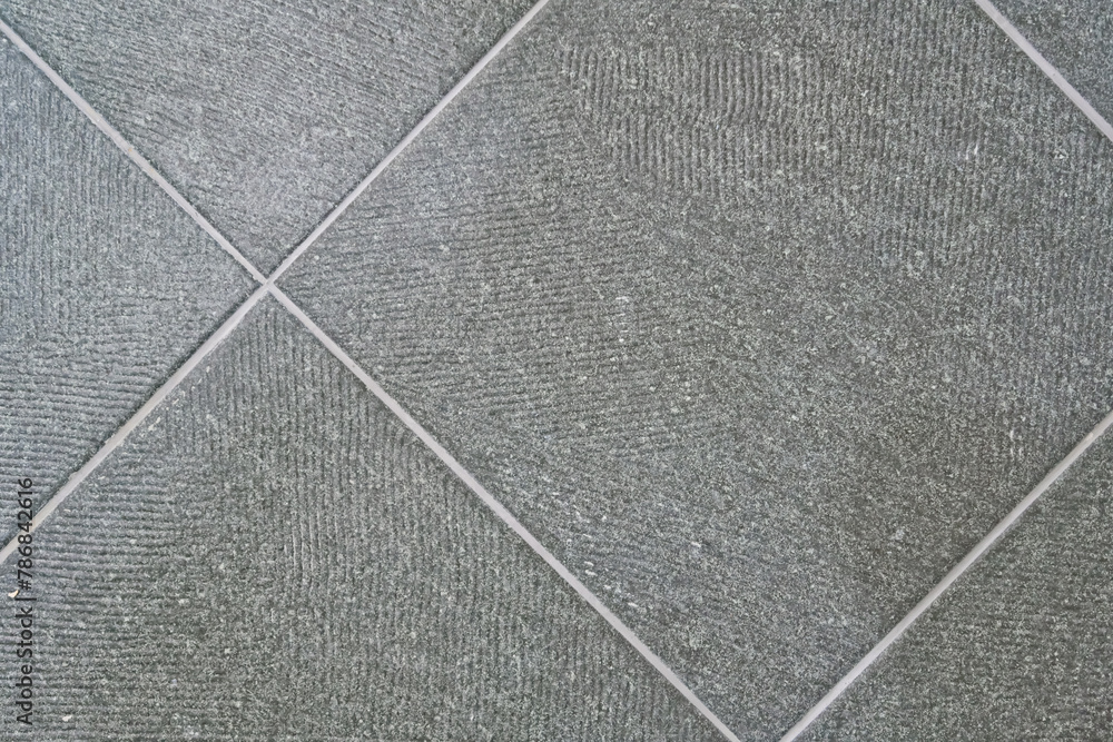 If you look closely at the tile, it is an interior tile with a comb pattern