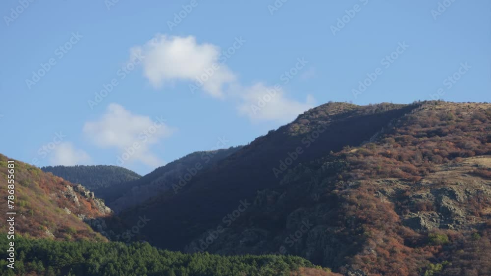 Beautiful time-lapse of hills in the Balkan Mountains, in Bulgaria. The morning sun chasing away the shadows. Beautiful time-lapse of hills in the Balkan Mountains, in Bulgaria. The morning sun chasing away the shadows.
