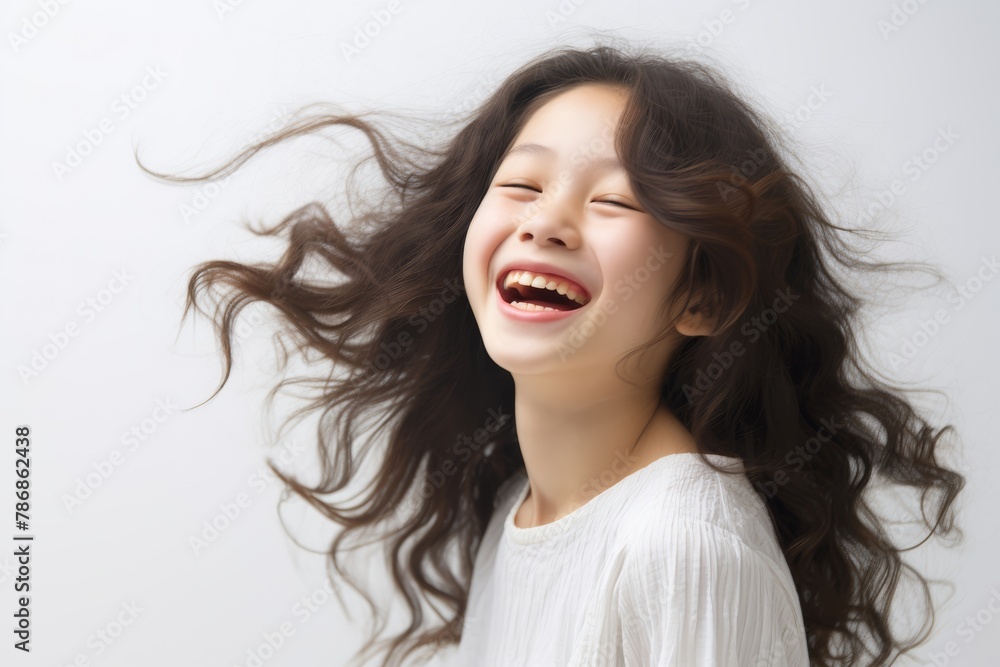 A beautiful Asian woman with long straight hair whose skin is tan is wearing an all white shirt, and smiling with a face which is full of happiness in a white room. Generative AI. A beautiful Asian woman with long straight hair whose skin is tan is wearing an all white shirt, and smiling with a face which is full of happiness in a white room. Generative AI.
