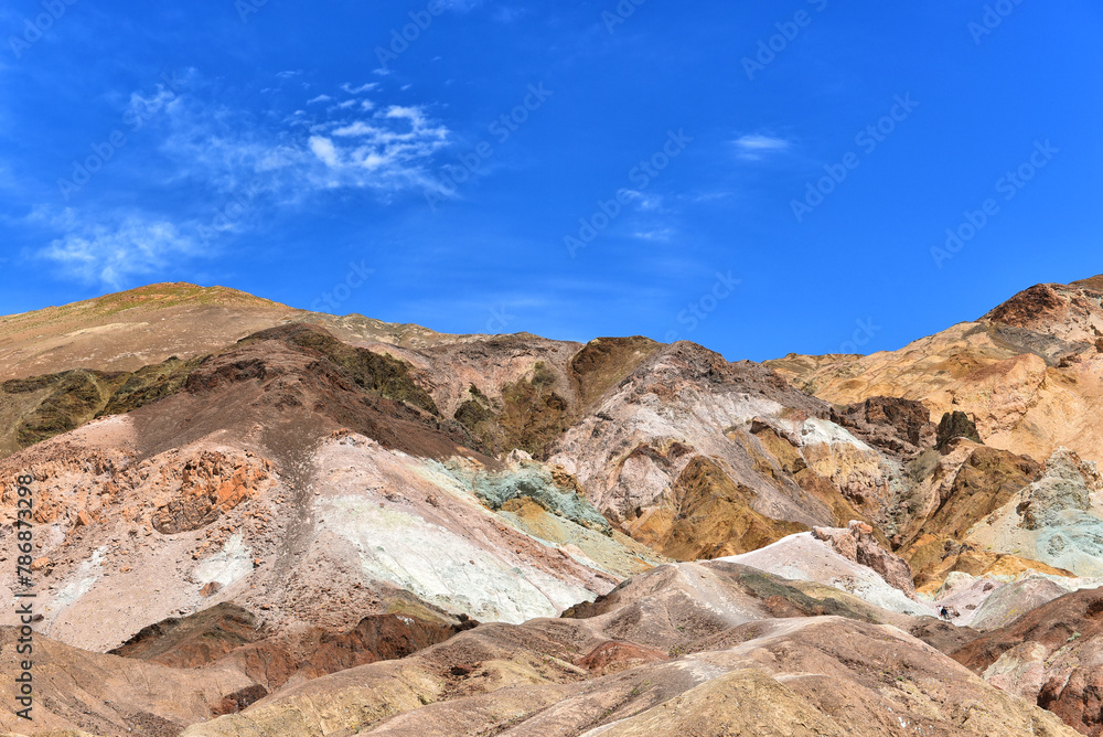 Death Valley National Parks colorful rainbow hills of Artists Pallette were formed by volcanic deposits of different compositions. Death Valley National Parks colorful rainbow hills of Artists Pallette were formed by volcanic deposits of different compositions.