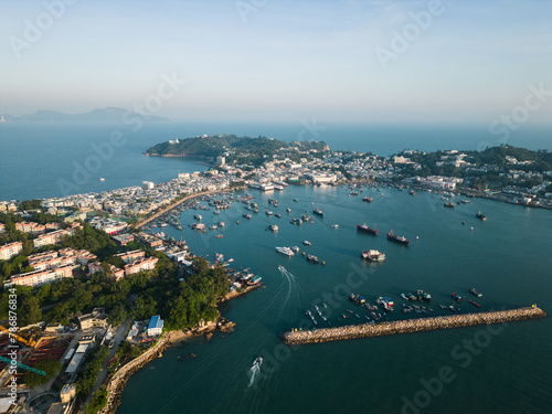 Photography Cheung Chau, Hong Kong: Aerial view of ta boat sailing toward the Cheung Chau island, fisherman harbor in Hongkong