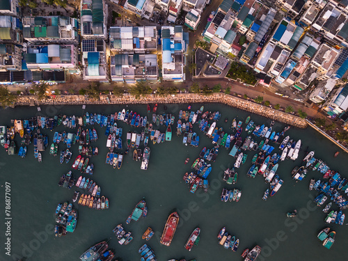 Cheung Chau, Hong Kong: Aerial top downview of the Cheung Chau island, famous for its authentic village and fisherman harbor at dusk photo