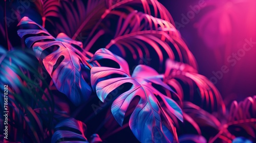 A frame made of leaves of tropical flowers in neon light. Purple background with space for text. The light of ultraviolet lamps for plants