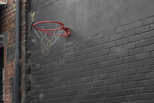 basketball hoop in the back streets of a city