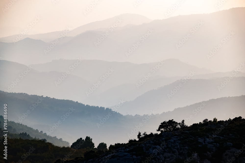 Fototapeta premium Silhouettes of mountains at sunset
