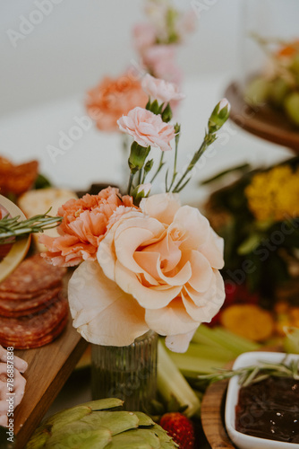 Closeup of Pink Carnations with Pink Roses at Charcuterie Table