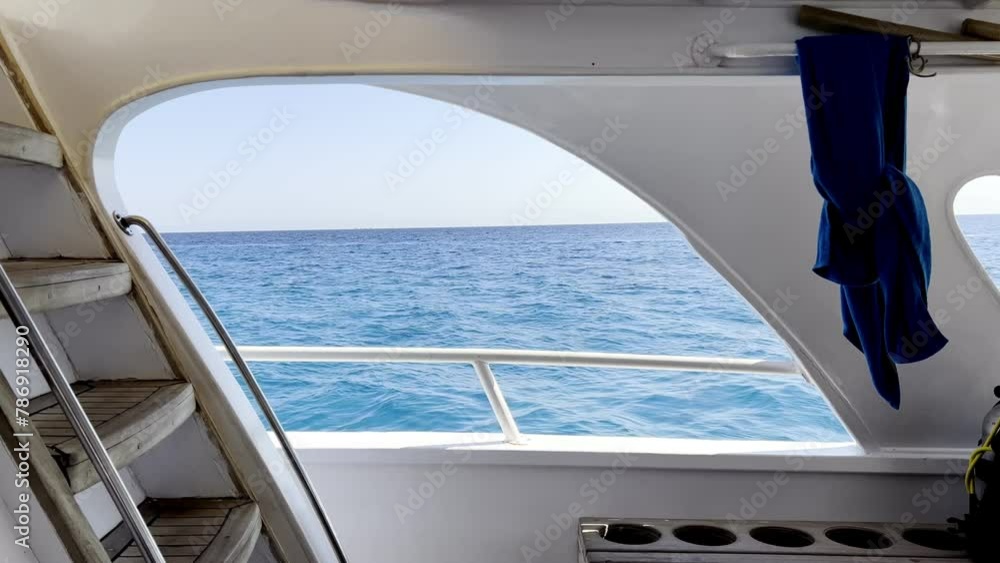 Yacht Floating On The Red Sea With Blue Waters In Summer In Egypt. - wide shot Yacht Floating On The Red Sea With Blue Waters In Summer In Egypt. - wide shot