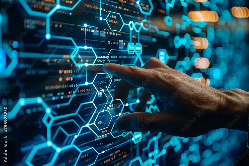 Close-up of a hand interacting with a futuristic blue holographic interface displaying various digital symbols and graphs. Close-up of a hand interacting with a futuristic blue holographic interface displaying various digital symbols and graphs.