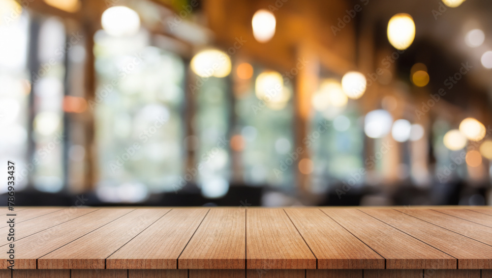 Empty wooden table top with lights bokeh on blur restaurant background. Empty wooden table top with lights bokeh on blur restaurant background.
