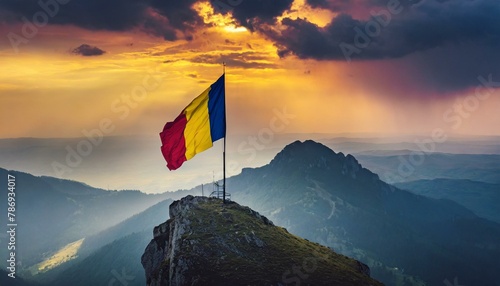 The Flag of Romania On The Mountain. photo