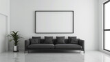 The modern living room embraces simplicity with its sleek charcoal sofa against a backdrop of crisp white walls, featuring an empty frame waiting to be adorned.