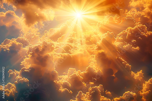 display of white and golden clouds with sunbeams breaking through
