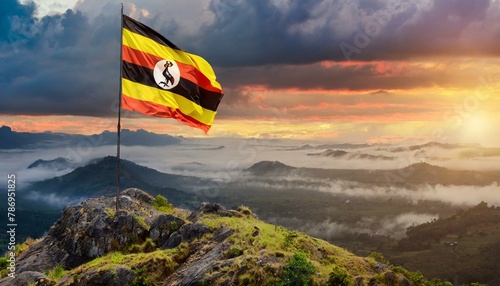 The Flag of Uganda On The Mountain. photo
