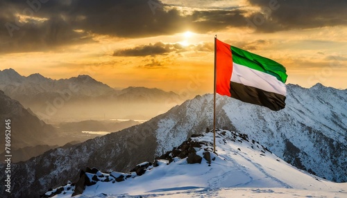 The Flag of United Arab Emirates On The Mountain. photo