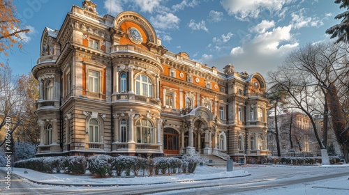 Grand historical building, adorned with intricate architectural details, bathed in warm sunlight against a crisp snowy background.