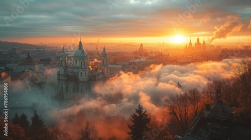 This panoramic image captures a stunning sunrise casting its golden hues over the historic city of Lviv, Ukraine. Majestic architecture emerges from the morning fog, creating a picturesque and serene 