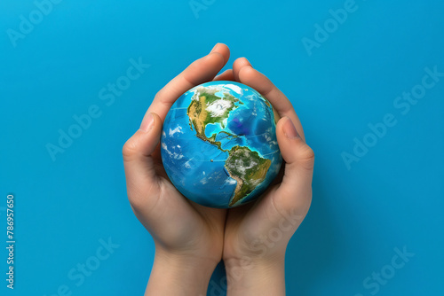 Hands Gently Holding a Miniature Earth  Representing Protection and Stewardship of Our Planet  Global Care